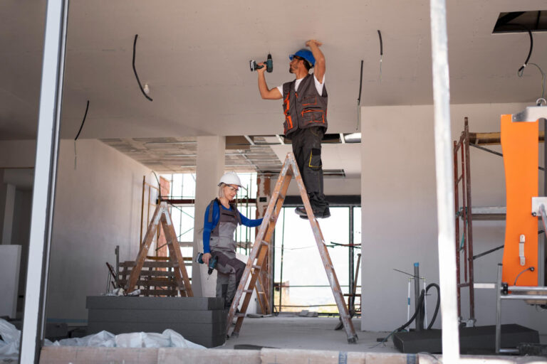 full-shot-man-woman-standing-ladder (1)